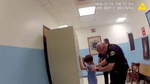 8 year old handcuffed