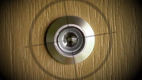 Woman Shot in Eye While Looking Through Apartment Peephole