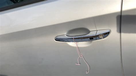 Here’s What You Should Do If You See A Wire Tired Around A Car Door Handle