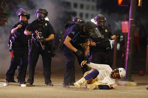 Jury awards $14M to George Floyd protesters in Denver