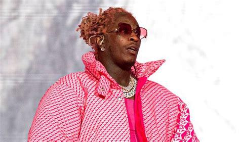 Rapper Young Thug hit with gang-related charges in sweeping indictment