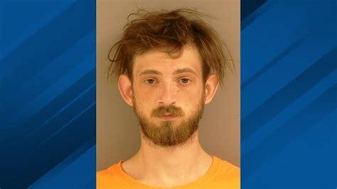 BAPD arrest man wearing tactical vest, carrying rifle in retail store