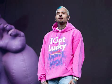 Chris Brown defends taking risqué photos with female fans