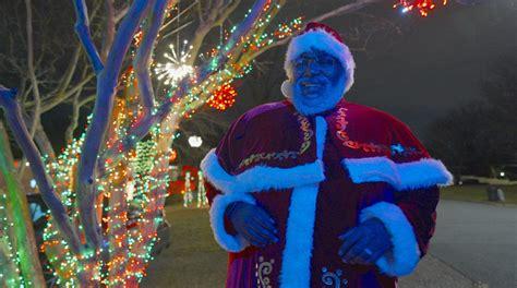 He was harassed for the Black Santa on his lawn. Now, he’s a professional Black Santa.