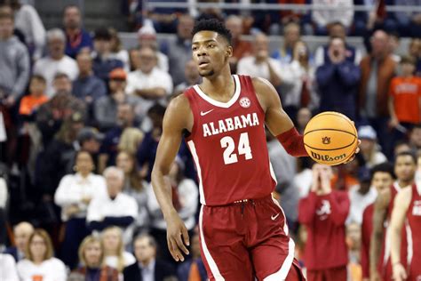 Police say Alabama star Brandon Miller delivered gun to former teammate Darius Miles before shooting