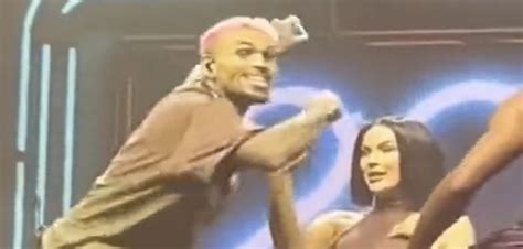 Chris Brown throws fan’s phone during his concert in Germany, after she starts recording him giving her a lap dance [VIDEO]