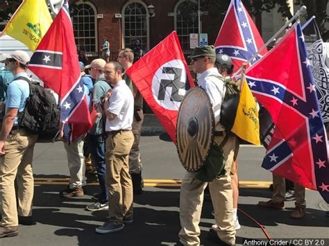 White supremacist groups aim to recruit US Military members to attack minorities